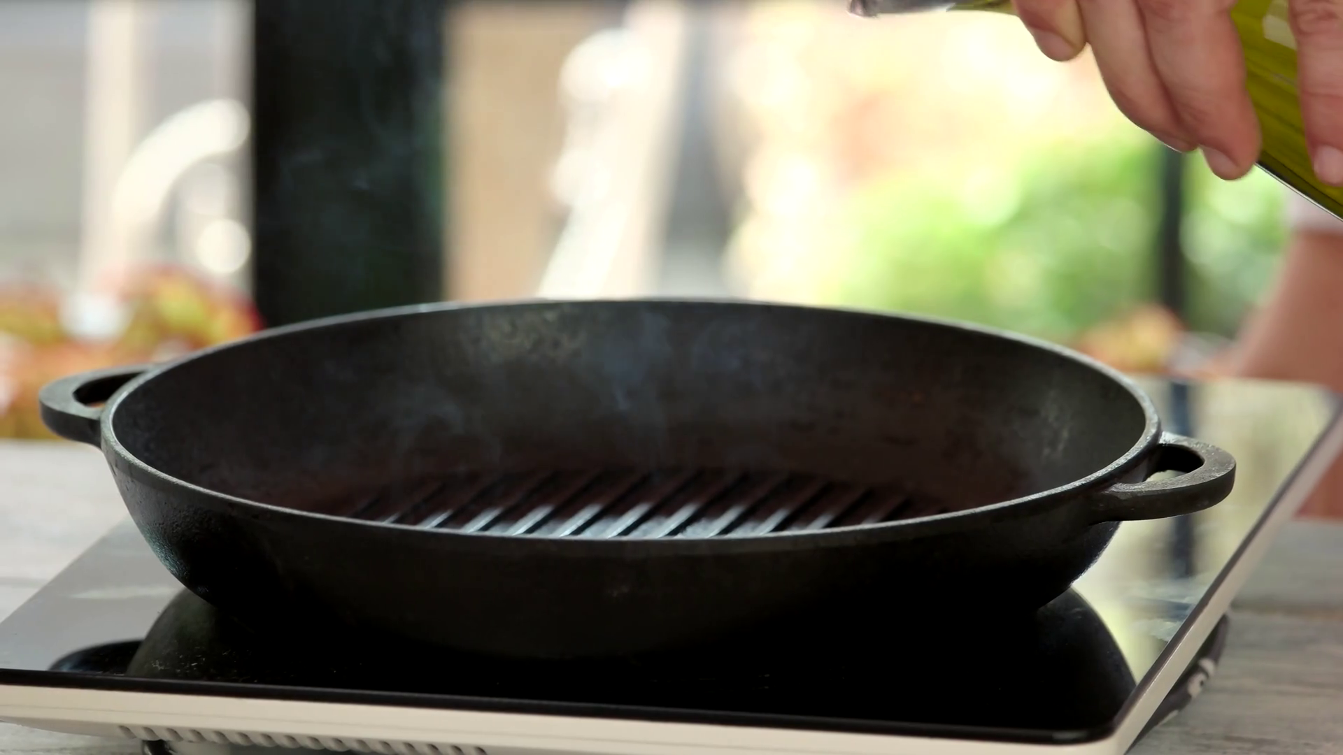 Hand Pours Oil In Pan Frying Pan On Stove Stock Footage SBV312679352