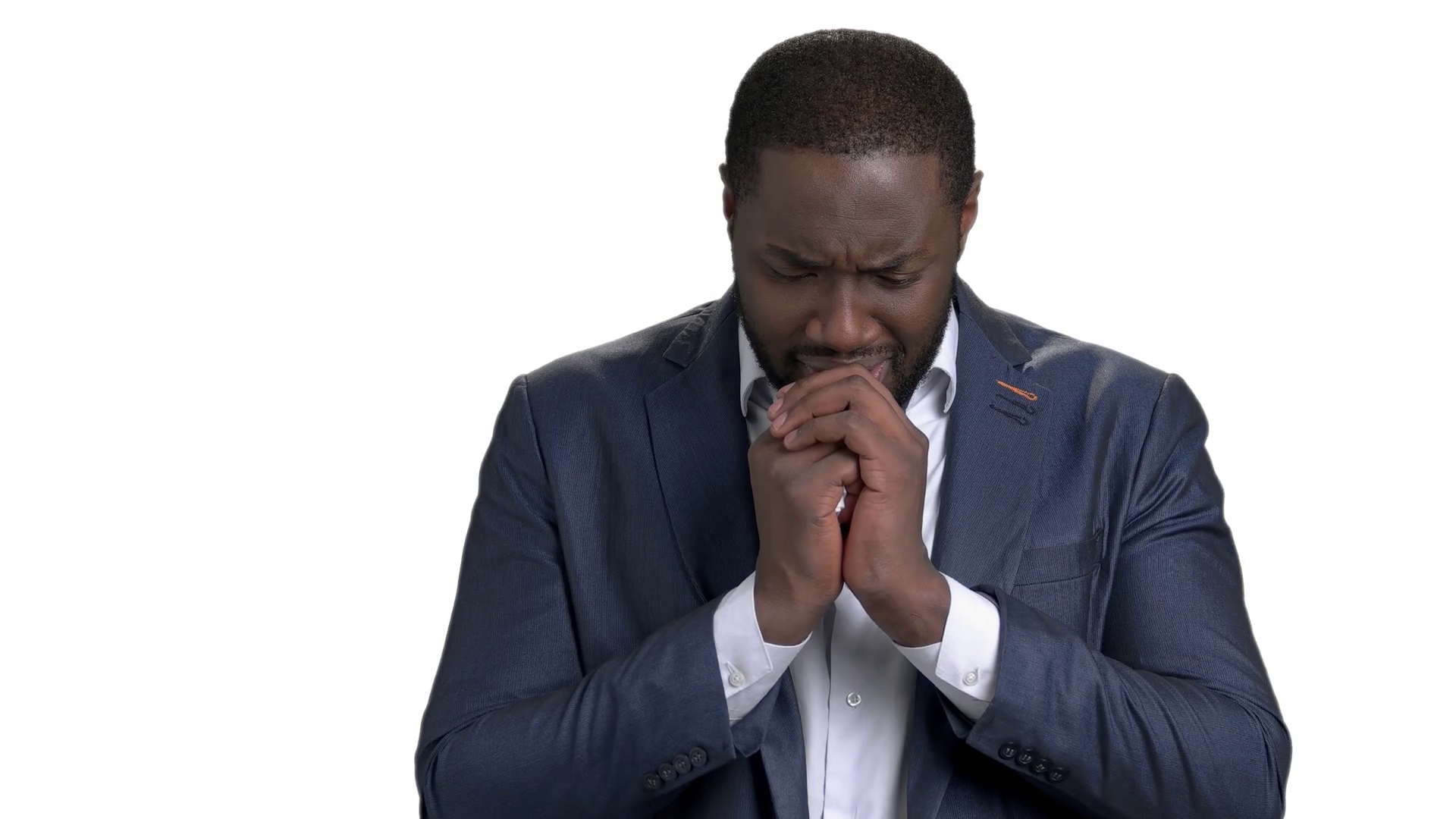 African businessman in desperate praying to god. Crying black