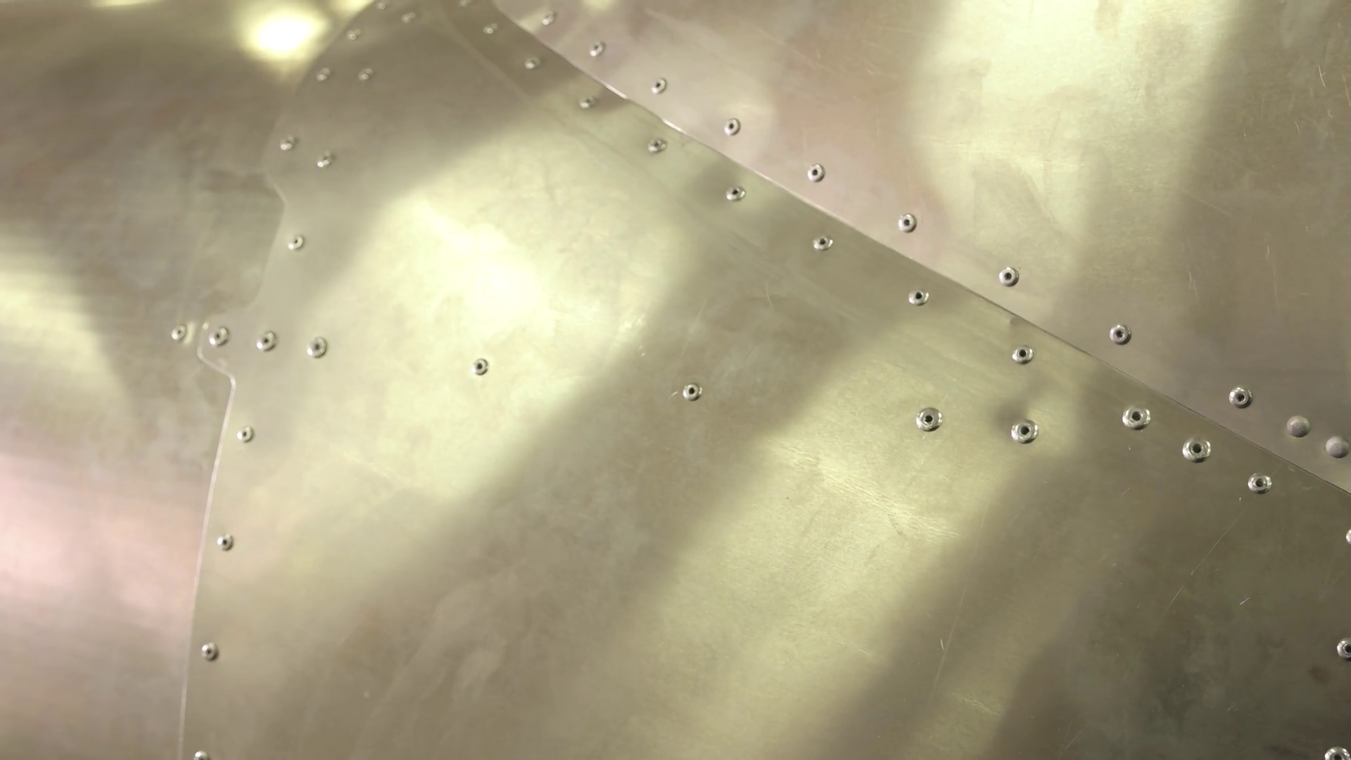 Aircraft Fuselage Close Up Metal Rivets Stock Footage SBV315819208