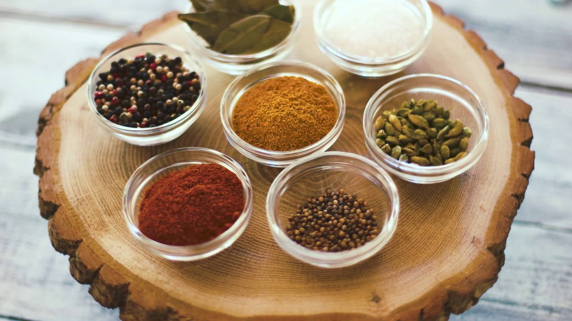 Bowls with spices. Salt and curry. Choose the best seasoning. Stock