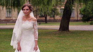 Bride in white dress makes a decision.