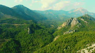 Spectacular view from drone of mountains covered with green forests.