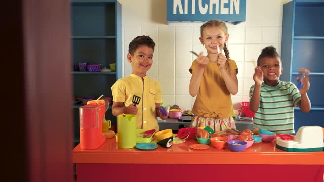 Kids Playing Kitchen Stock Footage: Royalty-Free Video Clips - Storyblocks