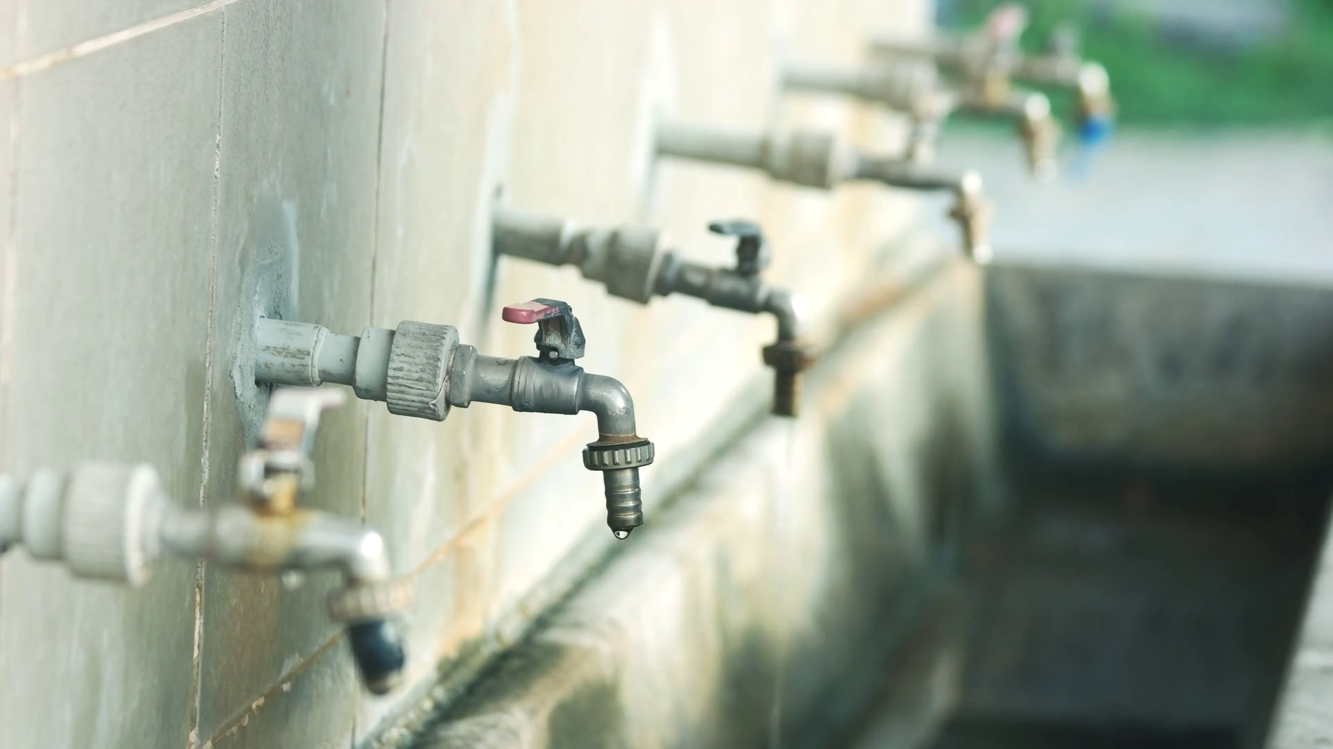 Water Dripping From Outside Taps Caucasian Stock Footage SBV337778312