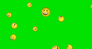 Rain of emojis laughing falling on green screen background. Lol emoticons flying in chroma key. Smiley face with laugh. Social media concept. 4k animation