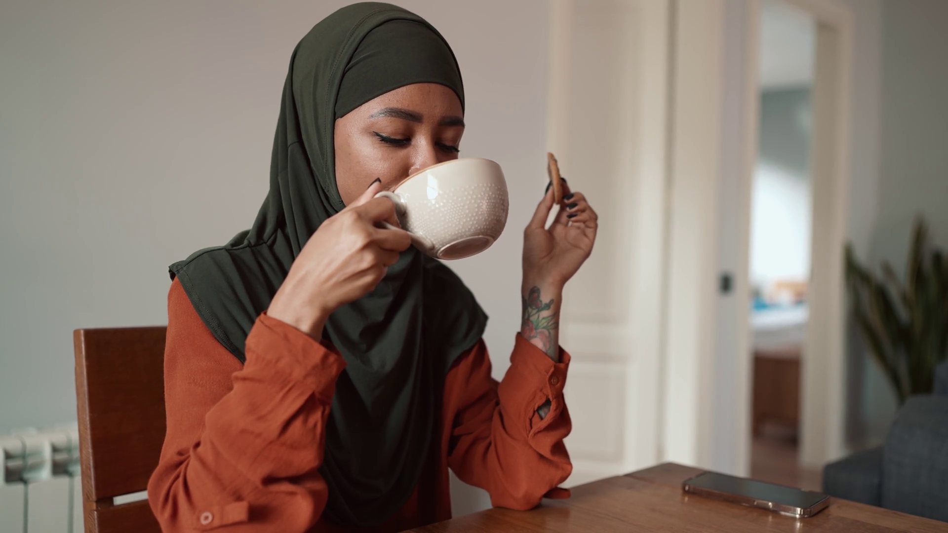 Smiling Muslim Woman Drinking Tea Stock Footage SBV-352483467 - Storyblocks
