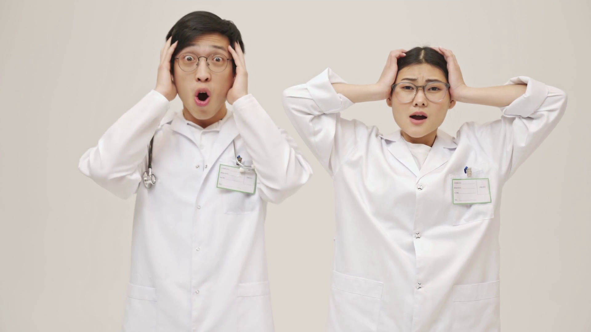 Shocked Emotional Young Asian Doctors Posing Stock Footage SBV