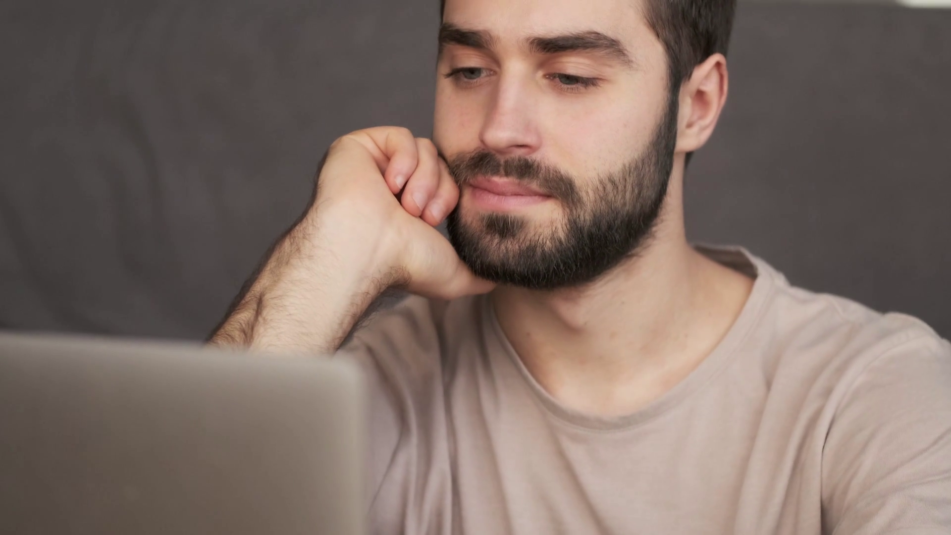 A Calm Young Man Is Using Laptop Computer Stock Footage SBV-352565537 ...