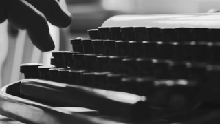 Black and white extreme close up on typewriter keys, Book writing on a vintage machine. Film script, book, letter. HD