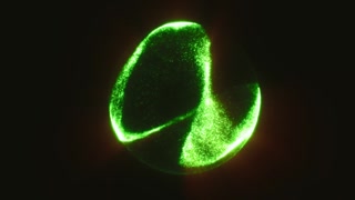 Glowing green particle sphere swirling in darkness