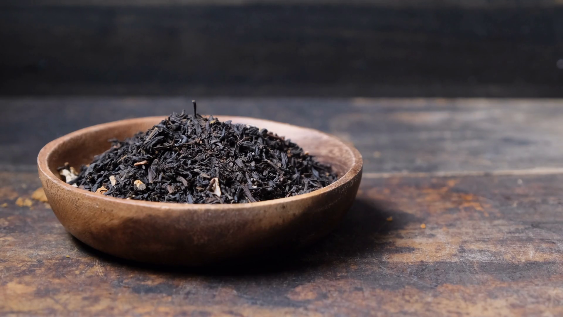 Dried Loose Black Tea Leaves In Wooden Bowl Stock Video Footage