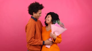 Portrait of lovely, young couple celebrating Valentine's Day together