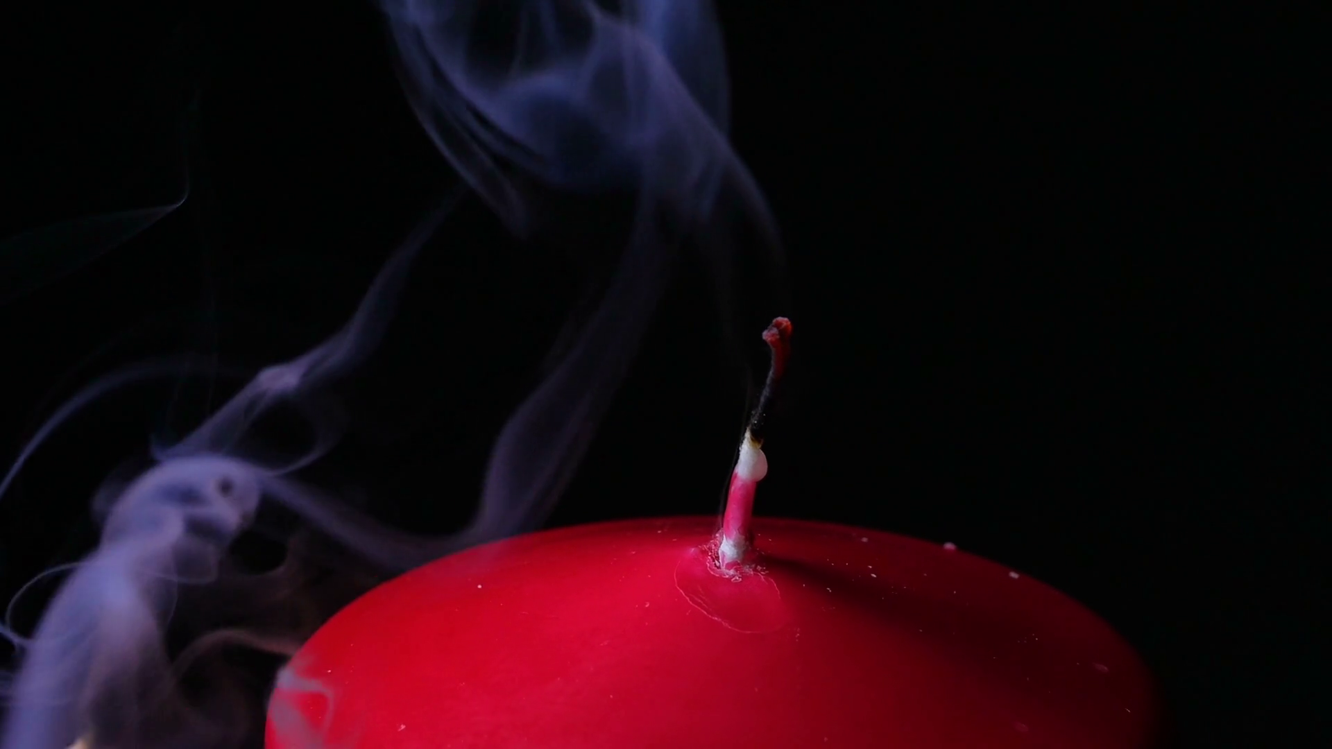 Macro Close Up Blowing Out Candles Makes Smoke Rotating Around Black