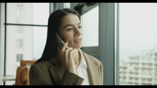Business communication. Successful businesswoman negotiate. Businesswoman smartphone, slow motion. Millennial businesswoman having business