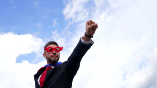 slow motions of leader in superhero mask, aspirations