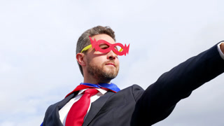 successful man in hero mask on sky background, superpower