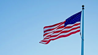 Patriotic symbol. American Flag for Memorial Day or 4th July. American flag waving in wind. Flag of the USA. National waving flag united
