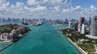 Landscape Miami south beach. Aerial view south pointe park. Hyperlapse aerial entering canal to Miami port. Hyperlapse aerial footage of