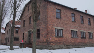 Brick barracks building at the auschwitz-birkenau concentration camp in poland during a cold winter