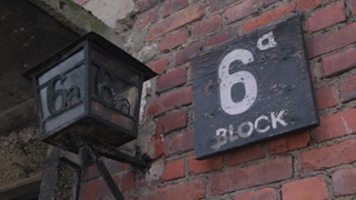 Block 6 sign on a brick wall at the auschwitz concentration camp memorial in poland