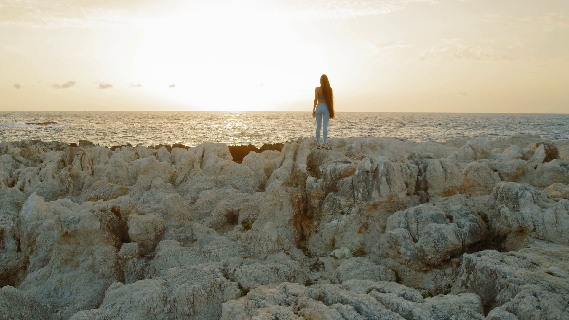 Silhouette Of Woman At Sunset Facing Sea On Stock Footage SBV-352710470 ...