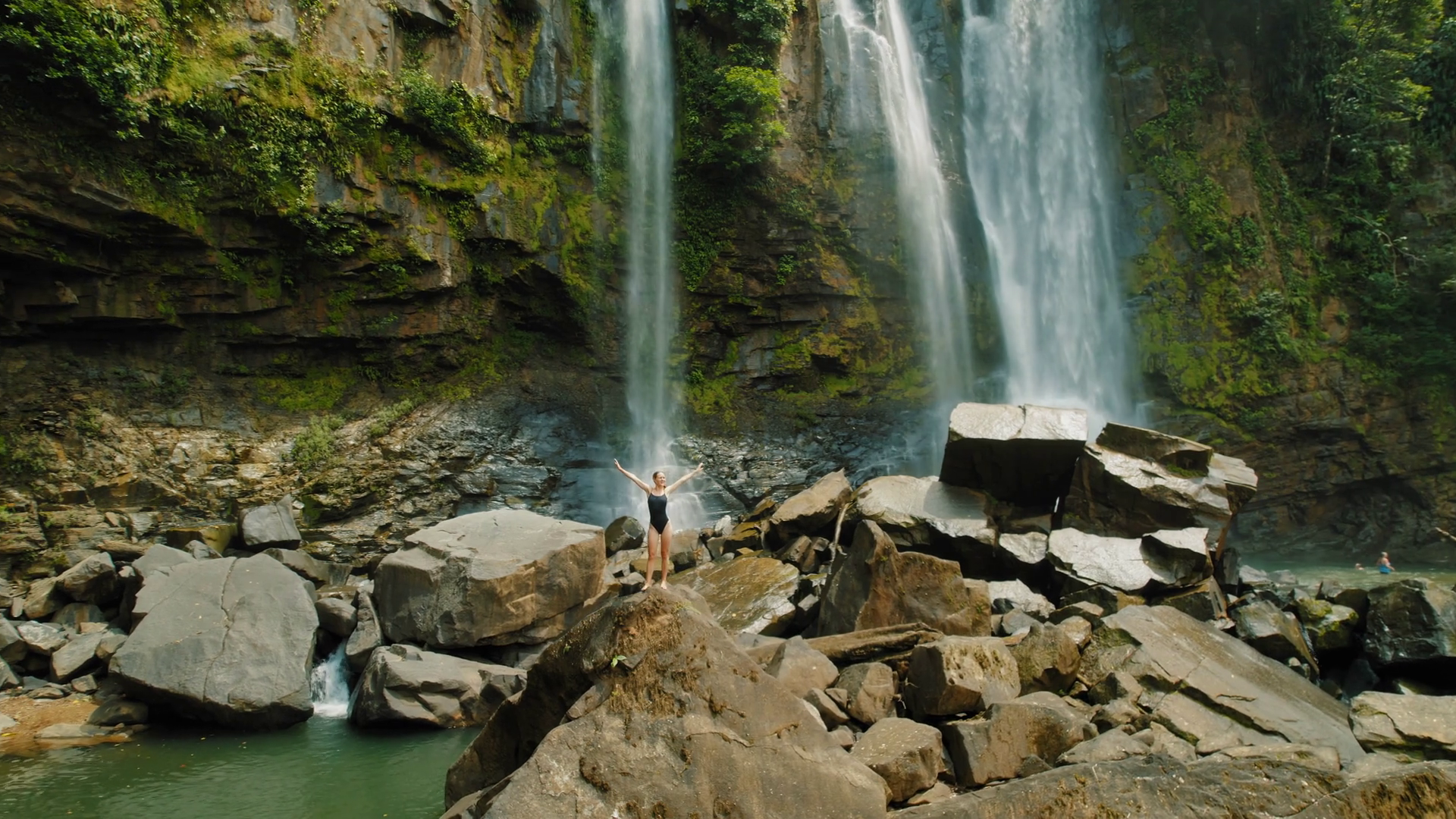 Woman Exploring Giant Rocks Cascading Stock Footage SBV-353324720 ...