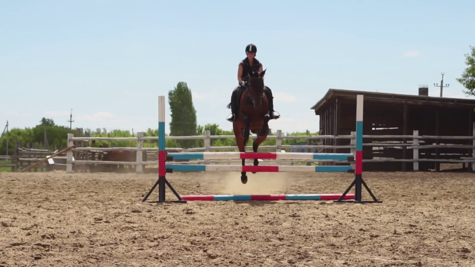 Horse woman jumps through the barrier on horseback slow motion Stock