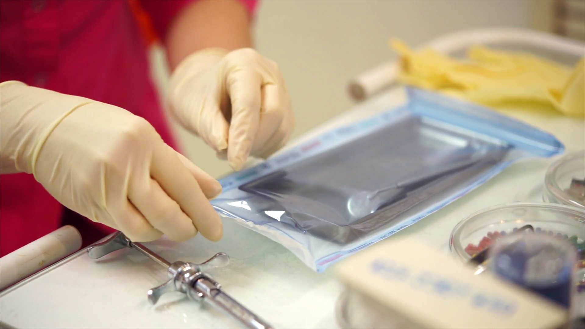 Female Dentist In Gloves Opening Package Stock Footage SBV315722089