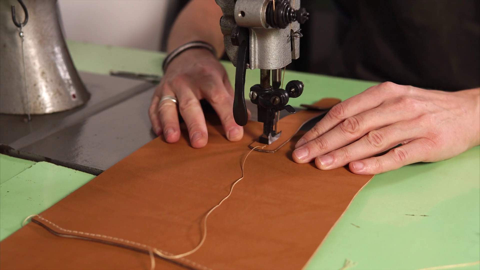 Tailor Is Stitching Sewing Machine Leather Stock Footage SBV318635092