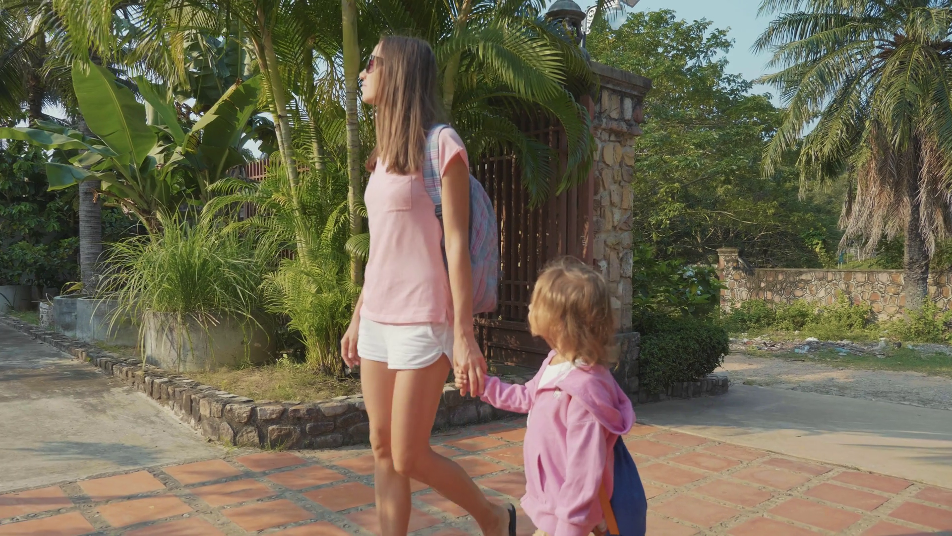Mother With Daughter Arriving At Hotel Goes Stock Footage SBV322403961