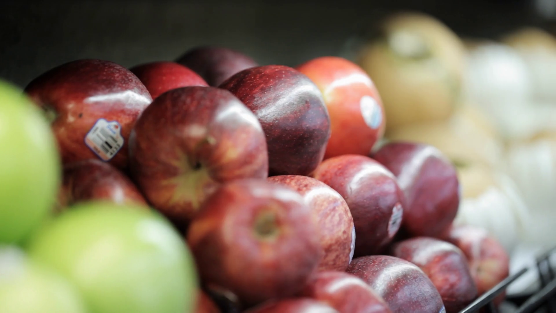 Woman selecting fresh apples in grocery store Stock Video Footage 0005