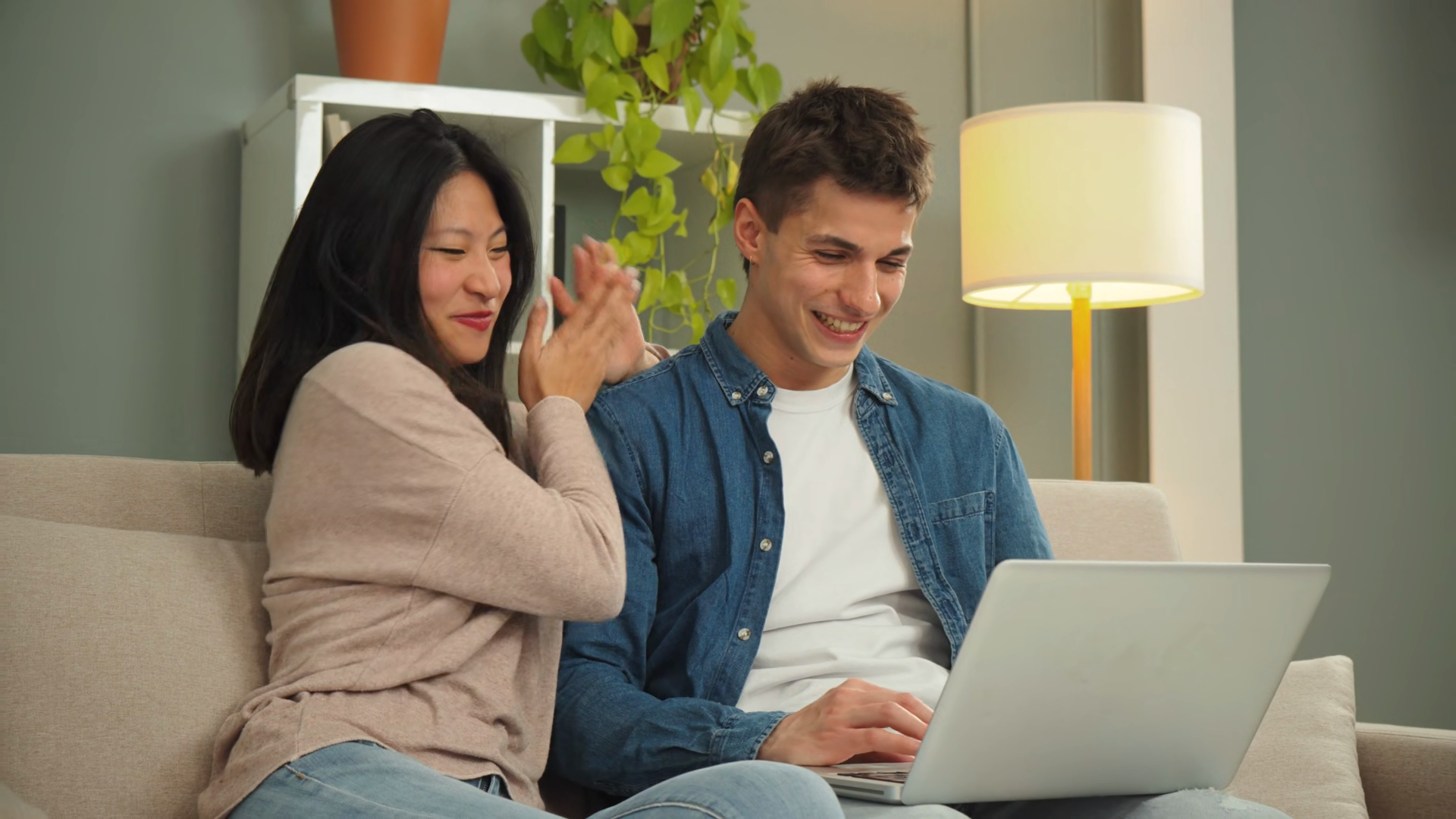 Young Couple Joyfully Exploring Online Stock Footage SBV-353781509 ...