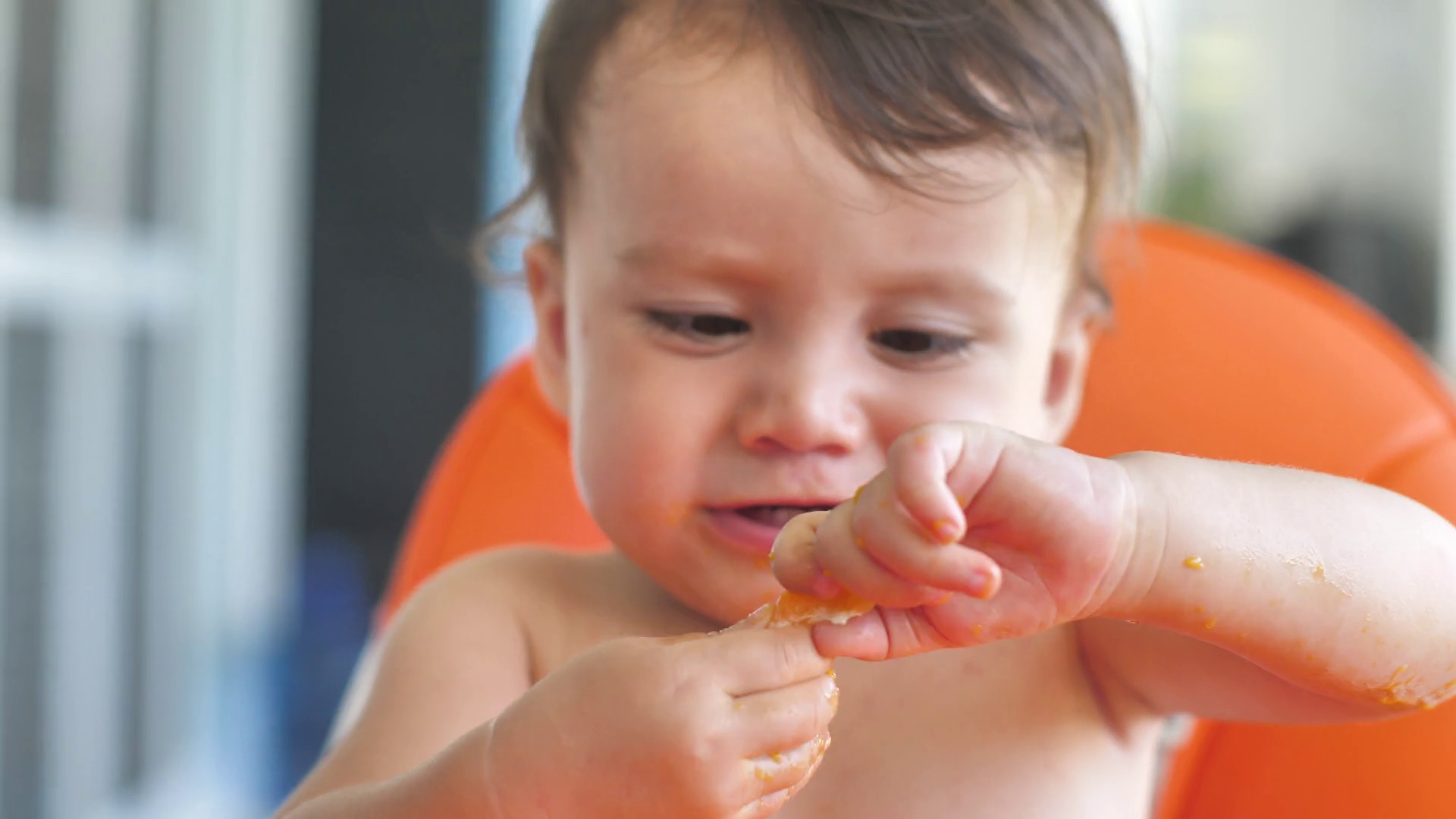 9 Months Old Baby Is Eating Biting Piece Of Stock Footage SBV346890035