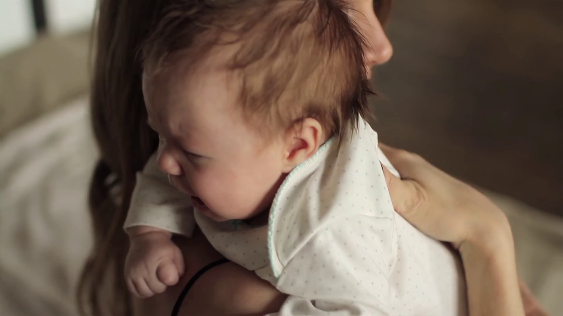 Baby Crying in the Arms of Mom Stock Video Footage 0010 SBV312975186 Storyblocks