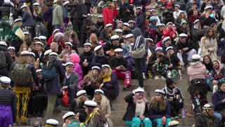 HELSINKI, FINLAND - APR 30, 2022: A huge crowd of students in traditional caps celebrate May Labor Day (Vappu) on the Senate Square