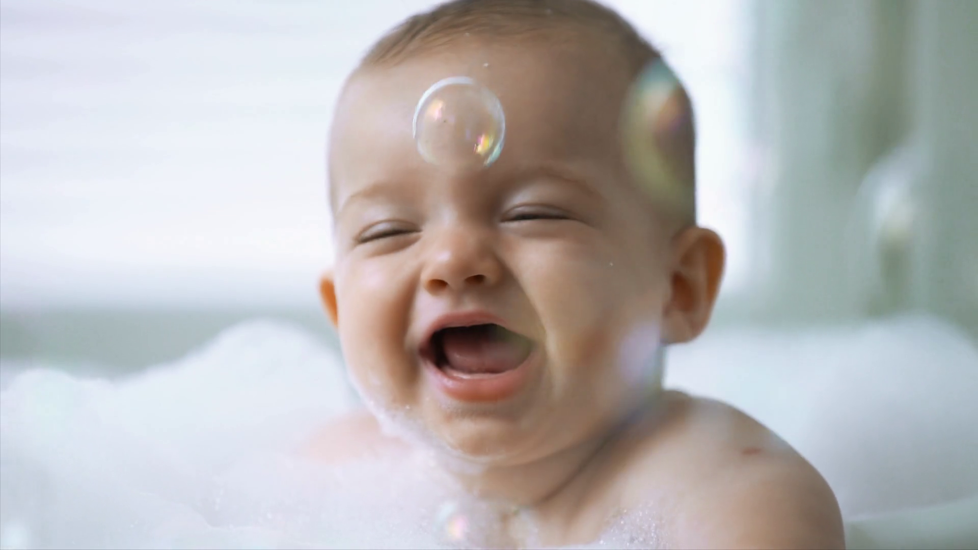 Healthy Six Month Old Baby Bathing With Foam Stock Footage SBV
