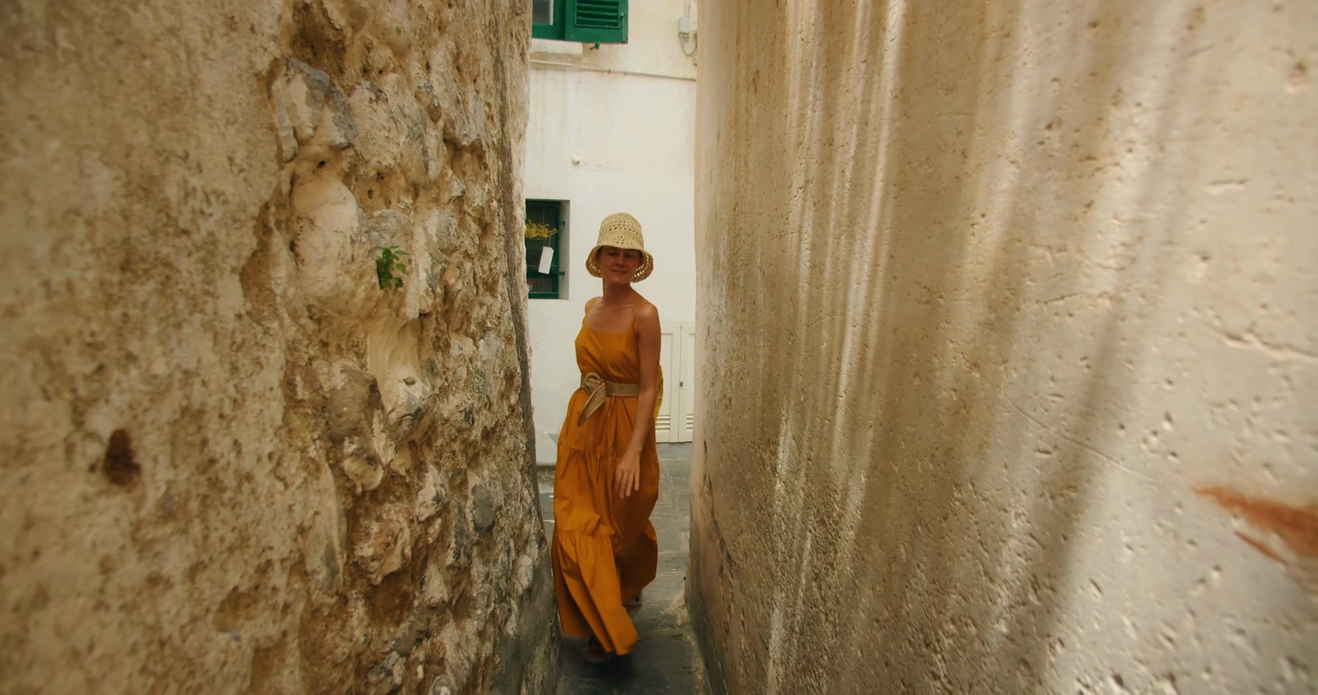 Woman Walks Through Narrow Alleyway Between Stock Footage SBV-352230280 ...