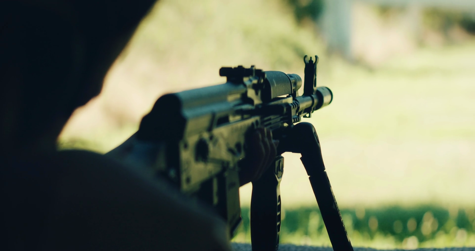 Shooter Holding Scoped Rifle On Bipod Aiming Stock Footage SBV ...