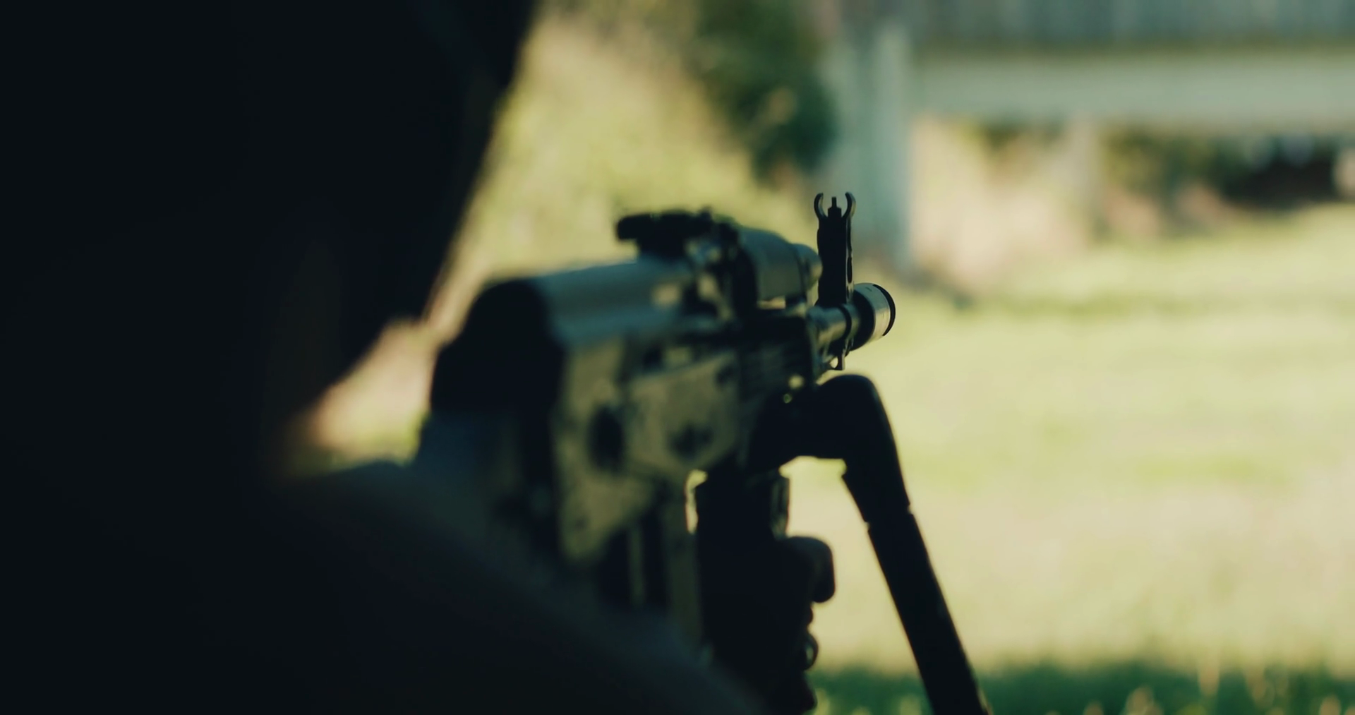Shooter Takes Aim With Scoped Rifle On Bipod Stock Footage SBV ...