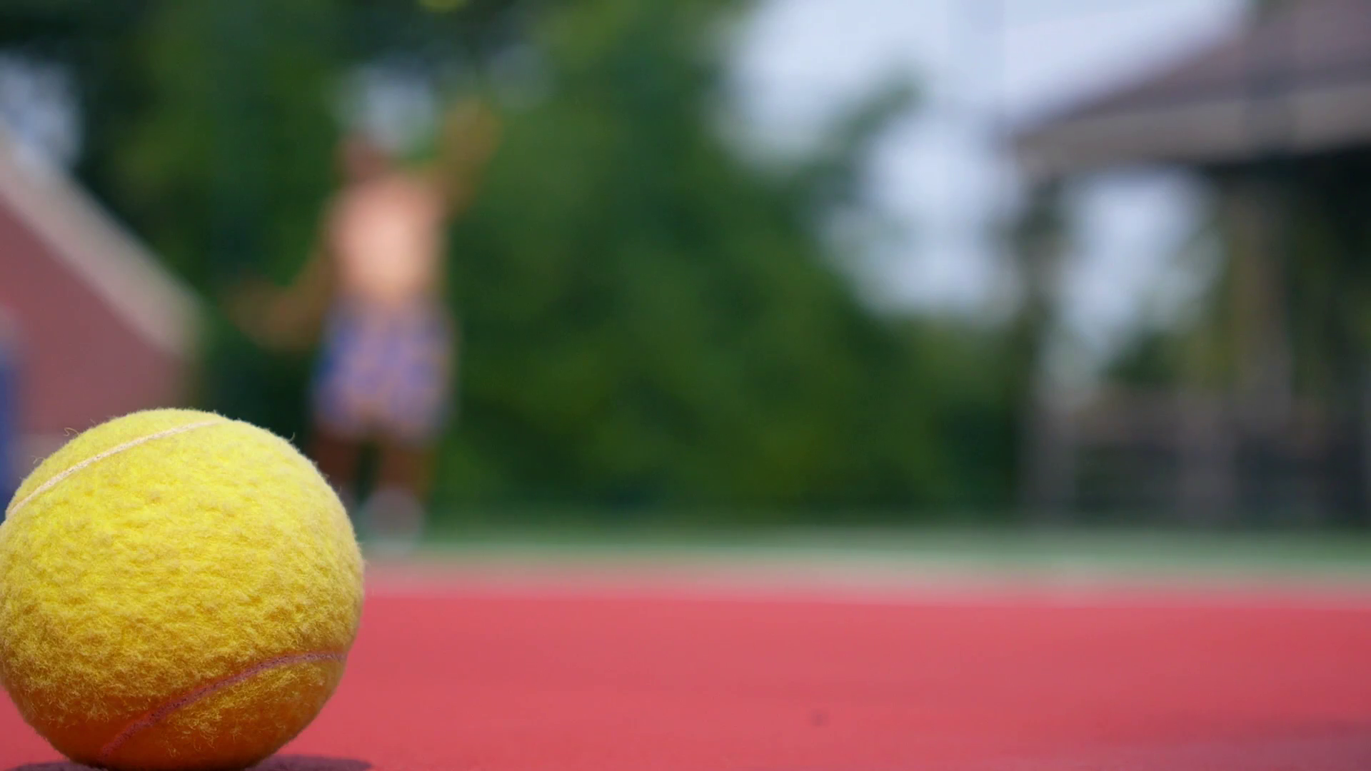 Tennis Ball In Focus On Court With Net Player Stock Footage SBV