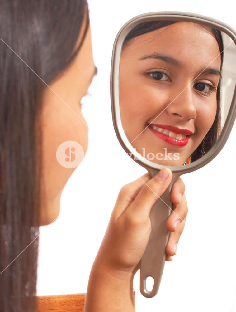 Beautiful Girl Looking In The Mirror Royalty Free Stock Image Storyblocks