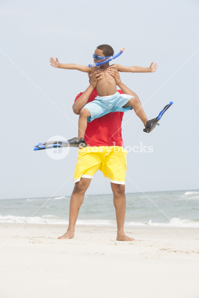 Boy with swim gear at the beach