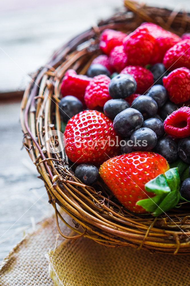 Berries On Wooden Background