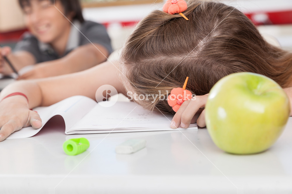 girl sleeping in class RoyaltyFree Stock Image Storyblocks