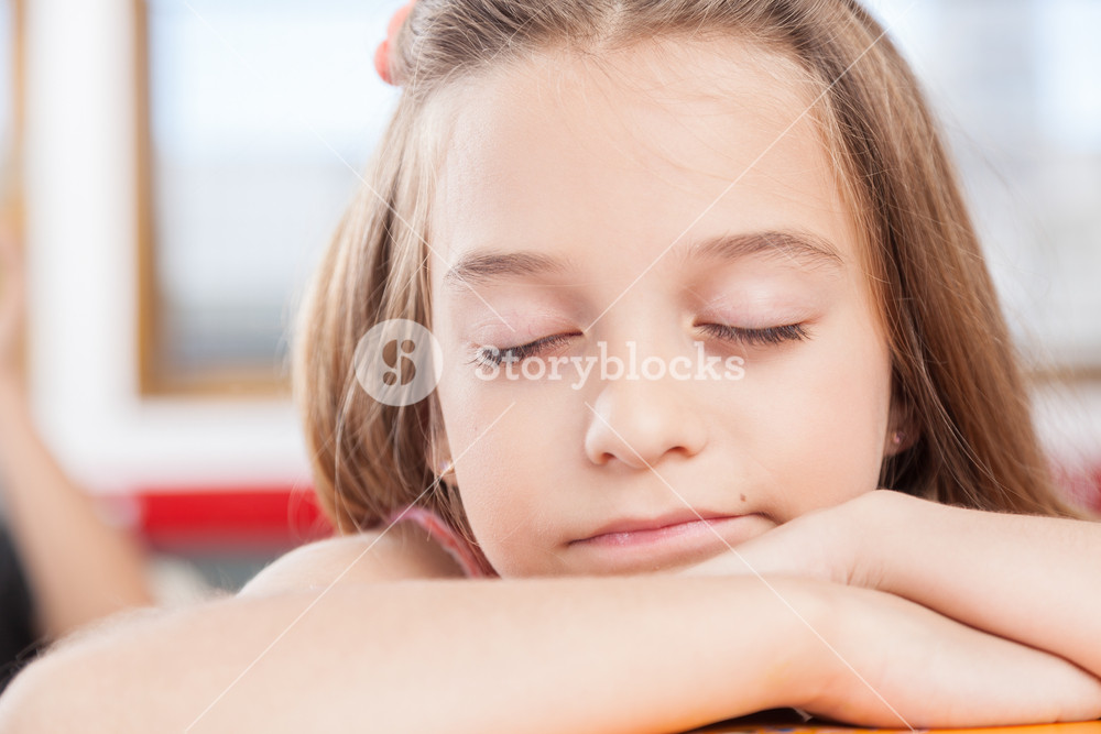 girl sleeping in class RoyaltyFree Stock Image Storyblocks