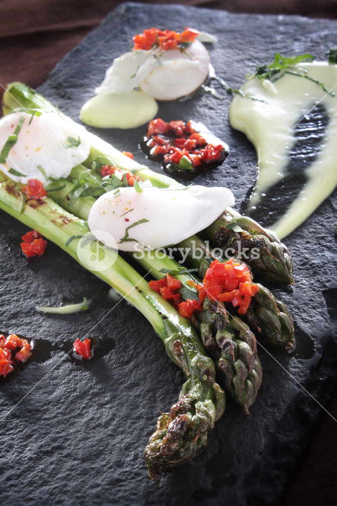 Plated Asparagus And Poached Quail Egg Appetizer RoyaltyFree Stock