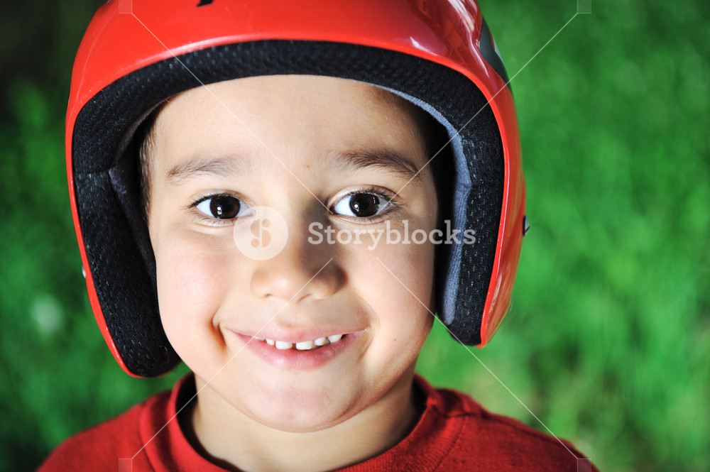 Little kid with biking safety helmet portrait RoyaltyFree Stock Image